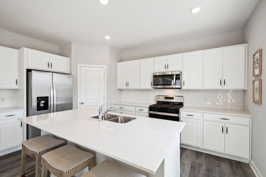 Photo of 907 Greenlawn Avenue W, Delano, MN 55328 (MLS # 7063072)