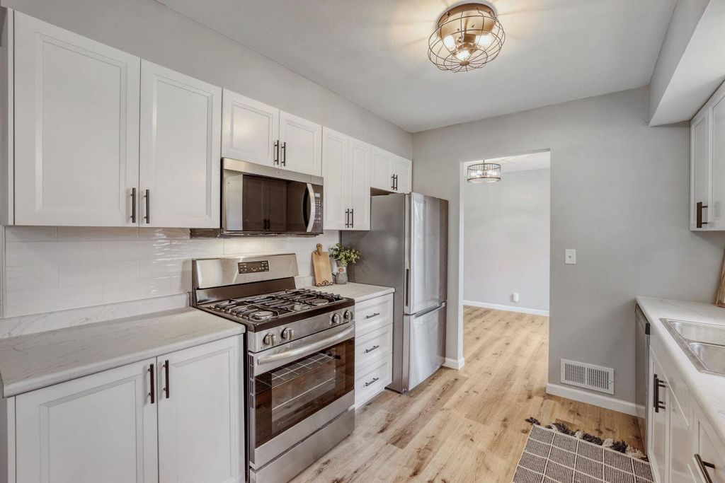 Photo of 7556 Noble Avenue N, Brooklyn Park, MN 55443 (MLS # 7056755)