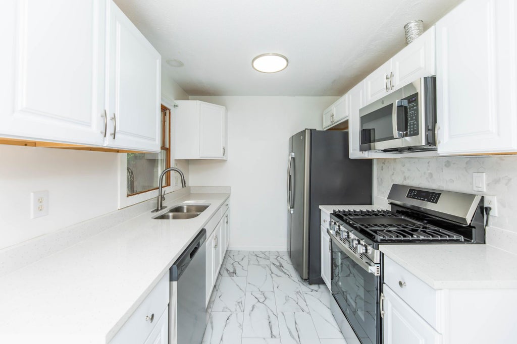 Photo of 8034 Jackson Street NE, Spring Lake Park, MN 55432 (MLS # 7091424)