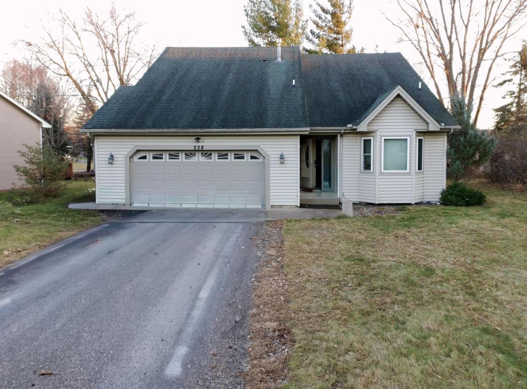 Photo of 228 126th Avenue NW, Minneapolis, MN 55448 (MLS # 7057134)