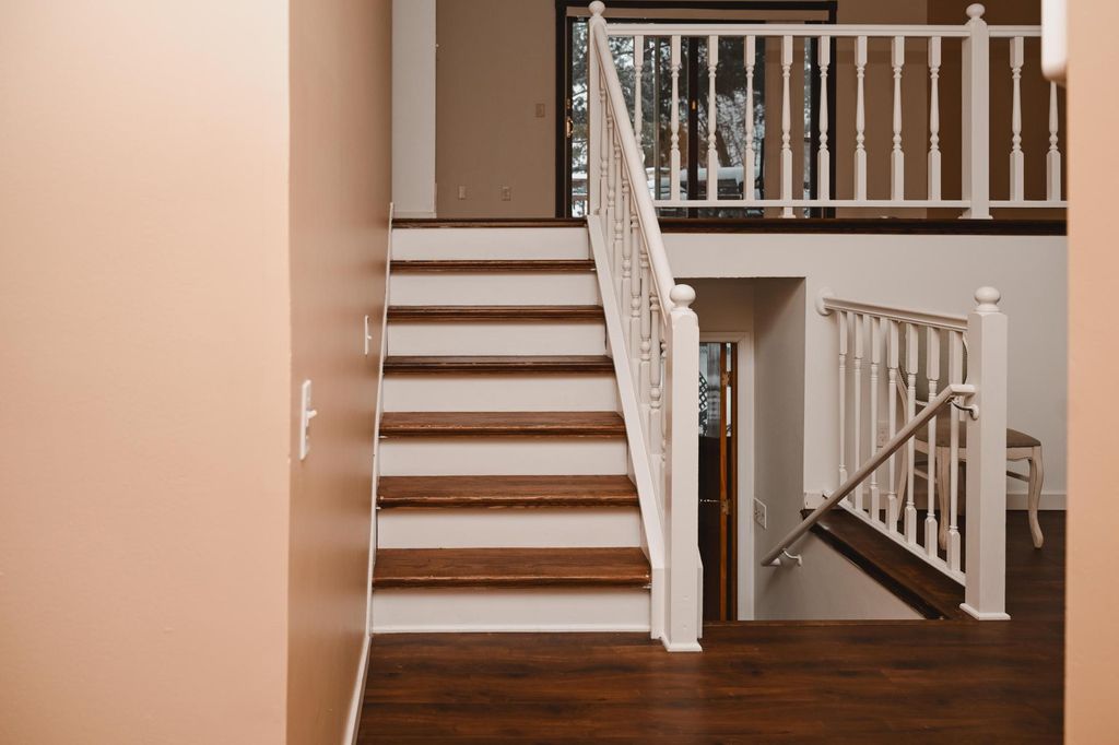 Photo of 228 126th Avenue NW, Minneapolis, MN 55448 (MLS # 7057134)