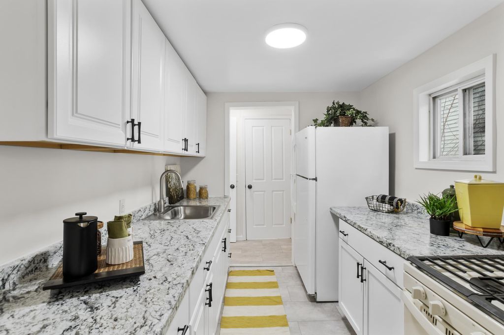 Photo of 818 E 36th Street, Minneapolis, MN 55407 (MLS # 7003952)