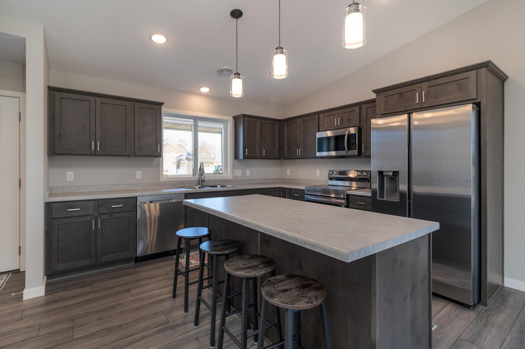 Photo of 1710 Maple Leaf Lane, Litchfield, MN 55355 (MLS # 7145226)