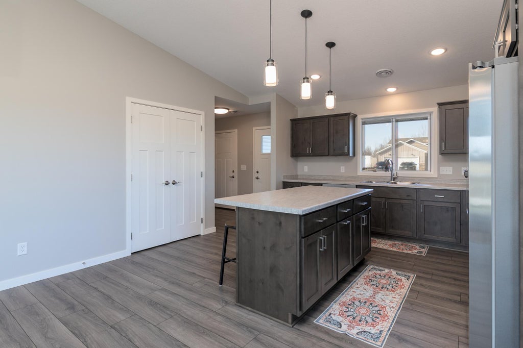 Photo of 1710 Maple Leaf Lane, Litchfield, MN 55355 (MLS # 7145226)