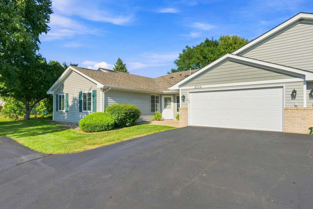 Photo of 8554 Telford Lane N, Brooklyn Park, MN 55443 (MLS # 7115174)