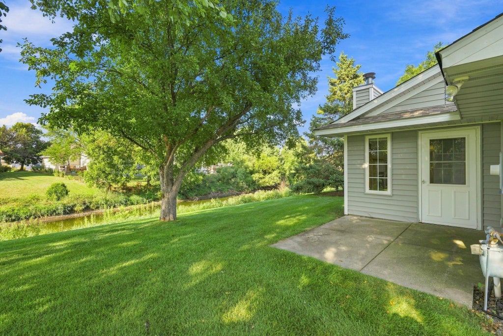 Photo of 8554 Telford Lane N, Brooklyn Park, MN 55443 (MLS # 7115174)