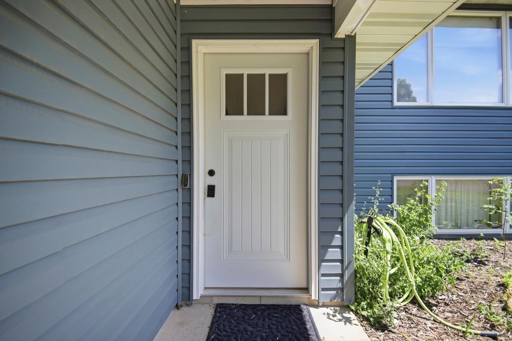 Photo of 717 Colonial Circle, Faribault, MN 55021 (MLS # 7100884)