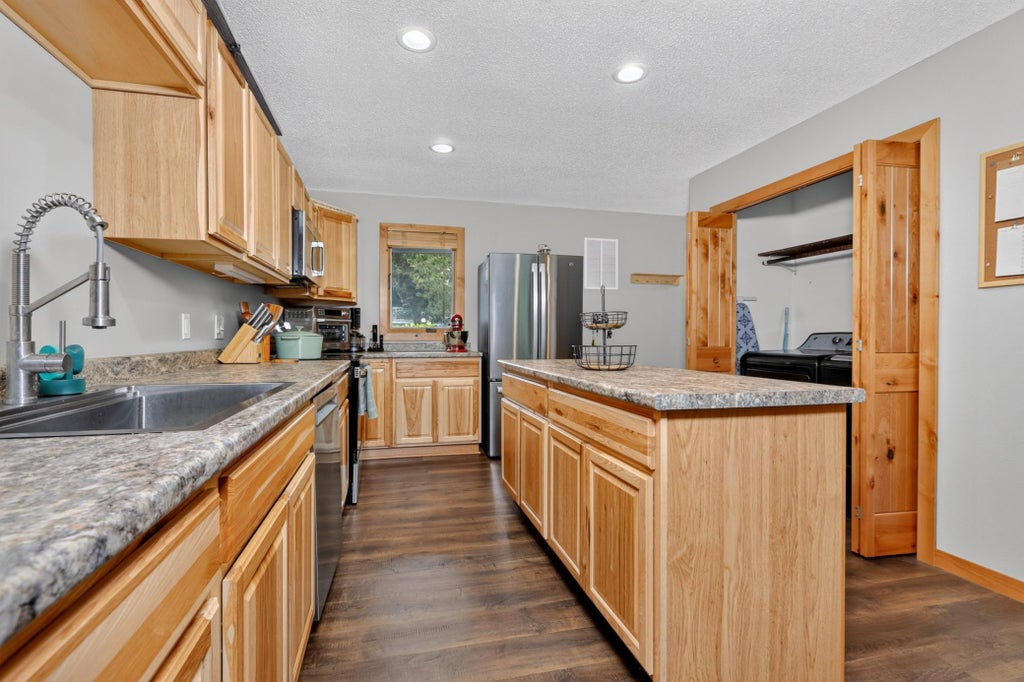 Photo of 402 Quadna Mountain Road, Hill City, MN 55748 (MLS # 7139299)