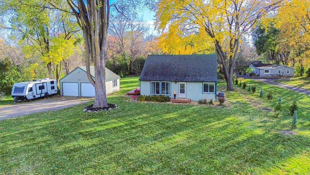 Photo of 7949 Stillwater Boulevard N, Oakdale, MN 55128 (MLS # 7077855)