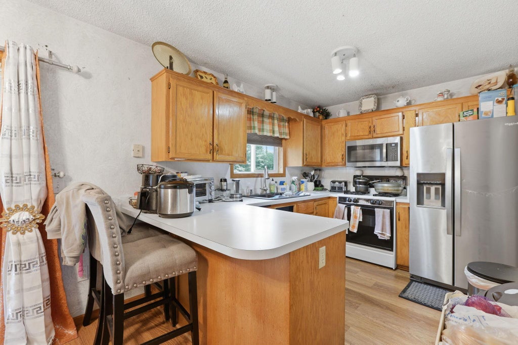 Photo of 14332 Tungsten Way NW, Ramsey, MN 55303 (MLS # 7097874)