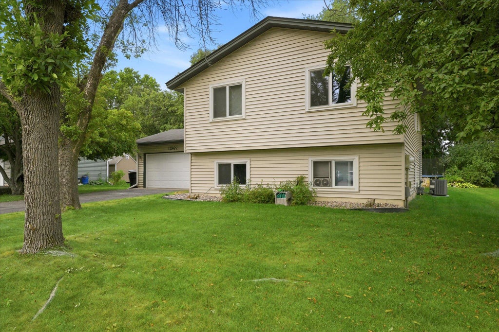 Photo of 11967 Wisconsin Avenue N, Champlin, MN 55316 (MLS # 7090250)