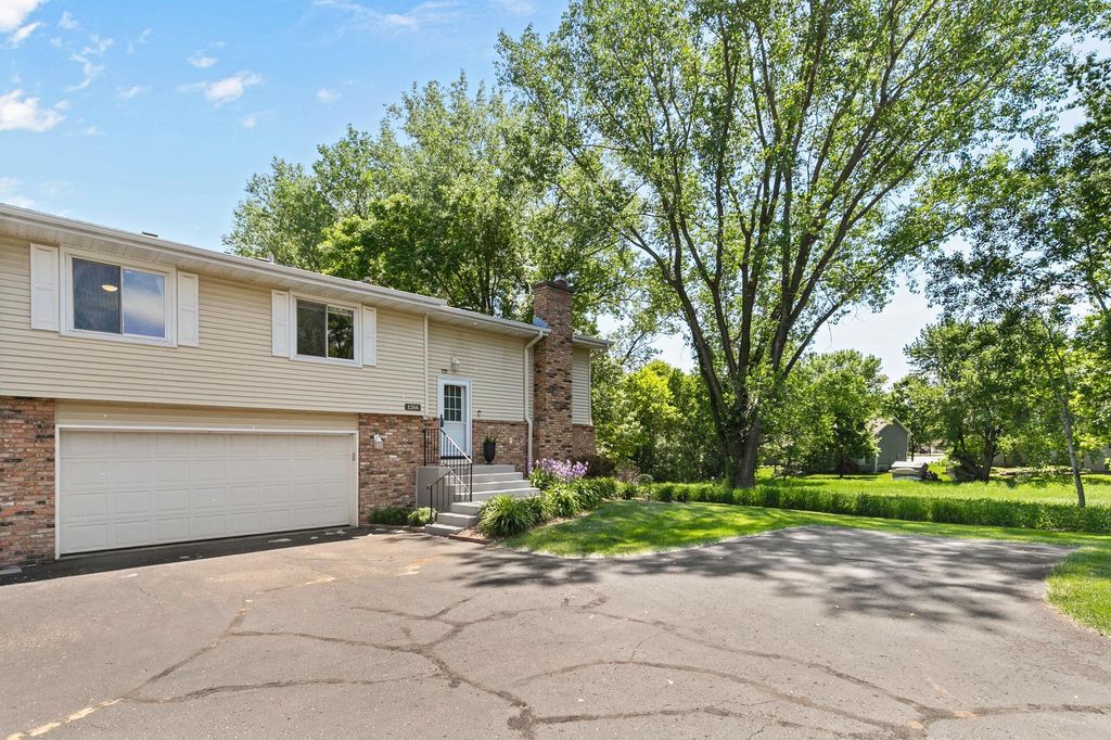 Photo of 1266 119th Lane NW, Coon Rapids, MN 55448 (MLS # 7078199)
