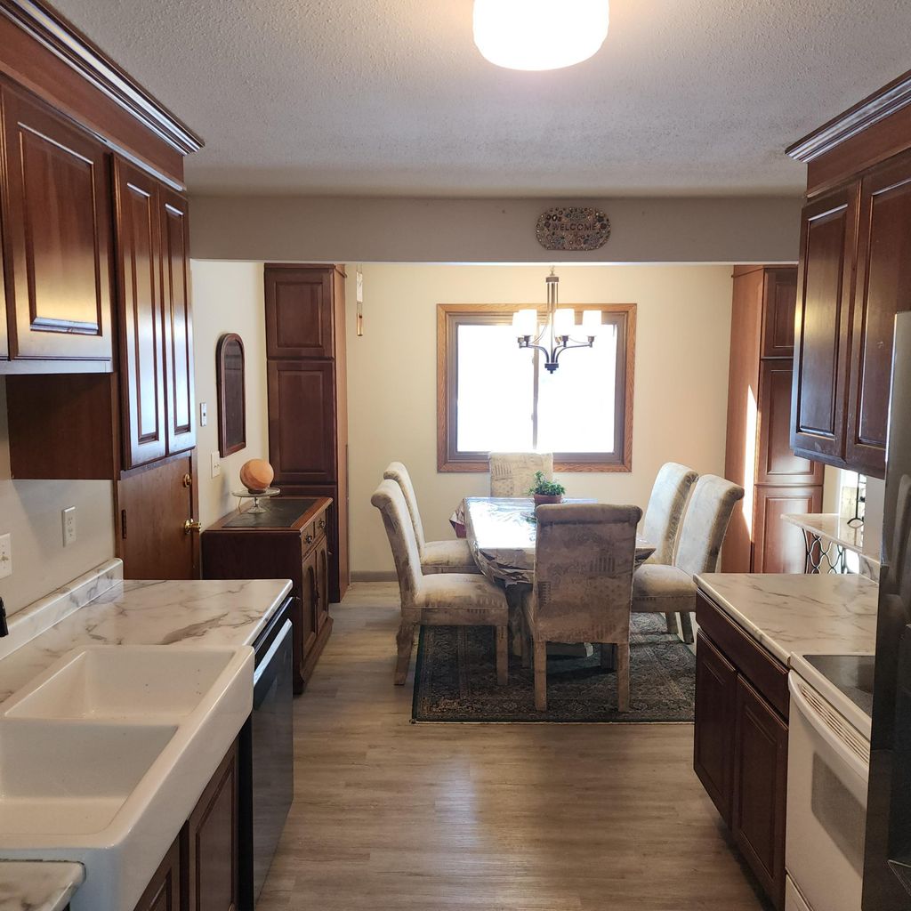 Photo of 5963 Oakwood Manor NE, Fridley, MN 55432 (MLS # 7015028)