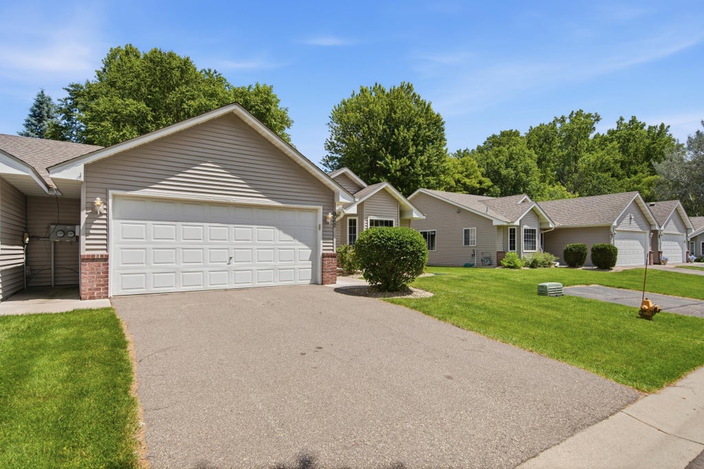 Photo of 922 105th Avenue NW, Coon Rapids, MN 55433 (MLS # 7095119)
