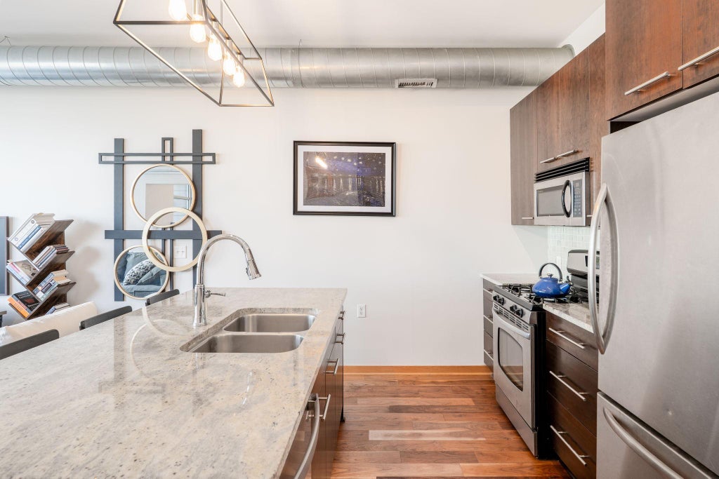 Photo of 1211 Lagoon Avenue #305, Minneapolis, MN 55408 (MLS # 7141341)