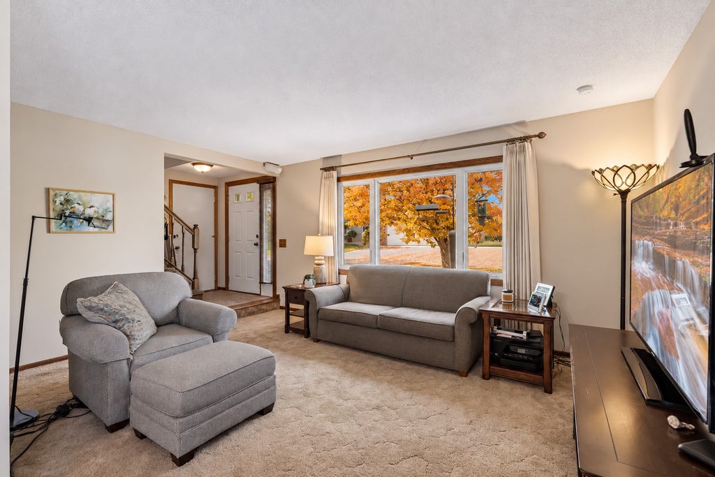 Photo of 9558 Kingsview Lane N, Maple Grove, MN 55369 (MLS # 7162738)