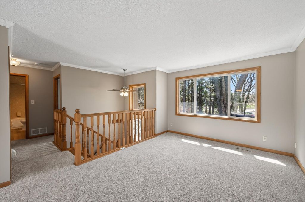 Photo of 6120 Valley Creek Road, Woodbury, MN 55125 (MLS # 7059081)