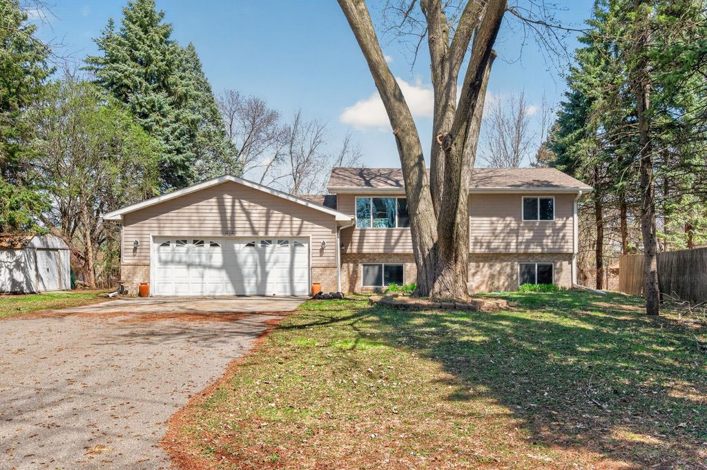 Photo of 6120 Valley Creek Road, Woodbury, MN 55125 (MLS # 7059081)