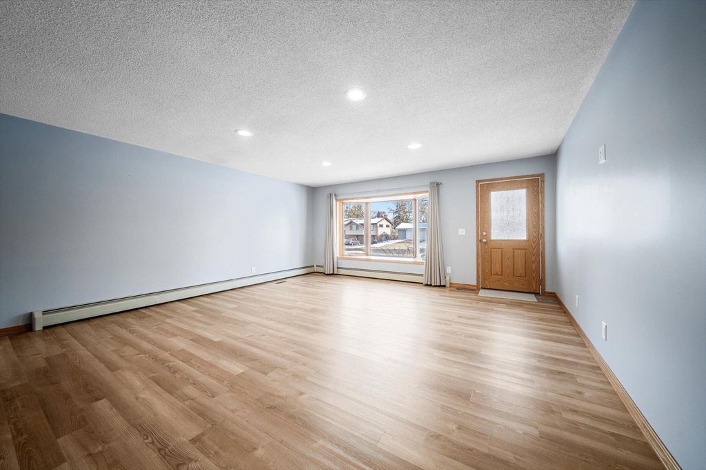 Photo of 5601 Schutta Road, Shoreview, MN 55126 (MLS # 6822338)