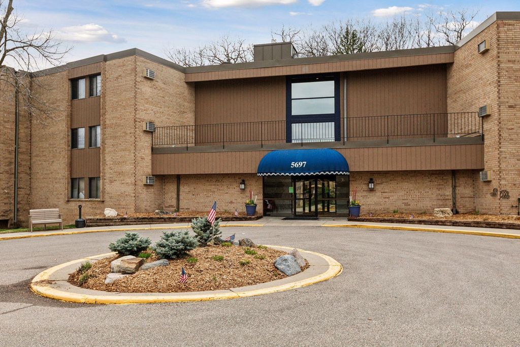 Photo of 5697 Green Circle Drive #101, Hopkins, MN 55343 (MLS # 7008842)