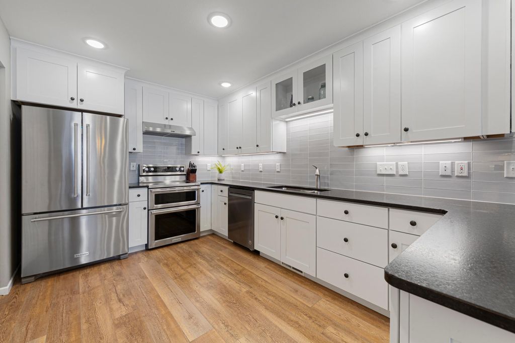 Photo of 1302 25th Avenue NW, Faribault, MN 55021 (MLS # 7008635)