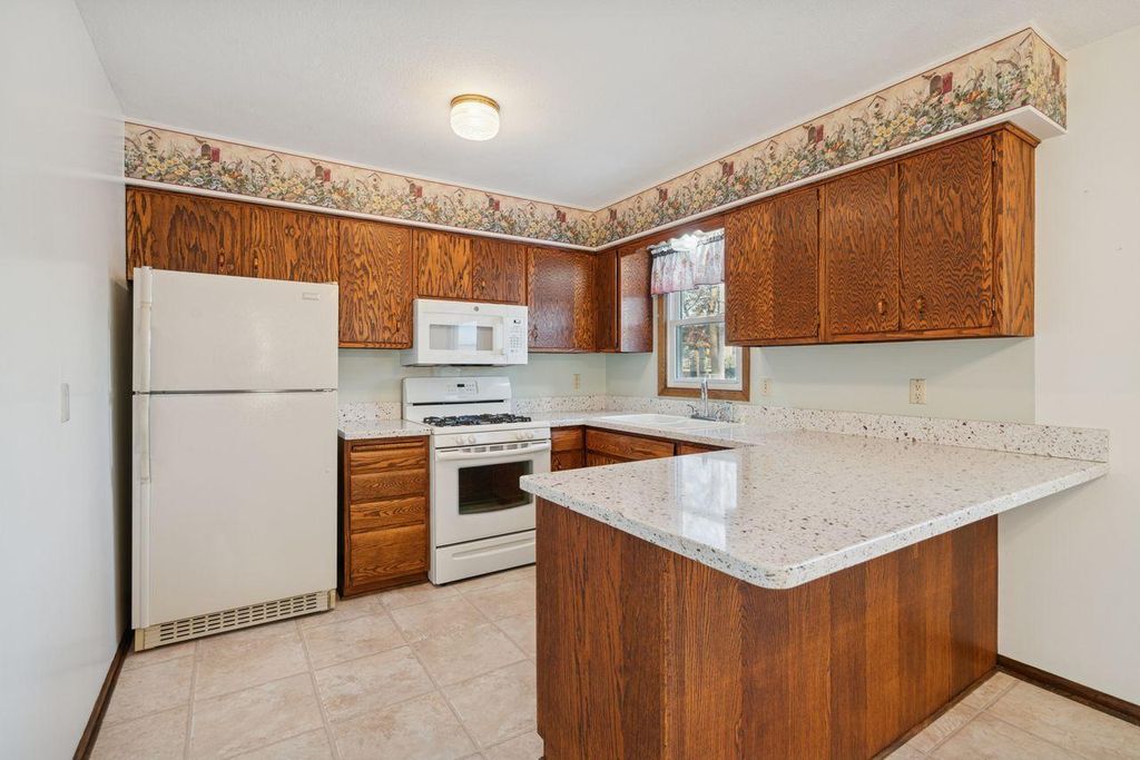 Photo of 11649 Washington Street NE, Blaine, MN 55434 (MLS # 7003603)