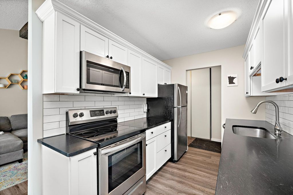 Photo of 4618 Cedar Lake Road S #6, Saint Louis Park, MN 55416 (MLS # 7017600)