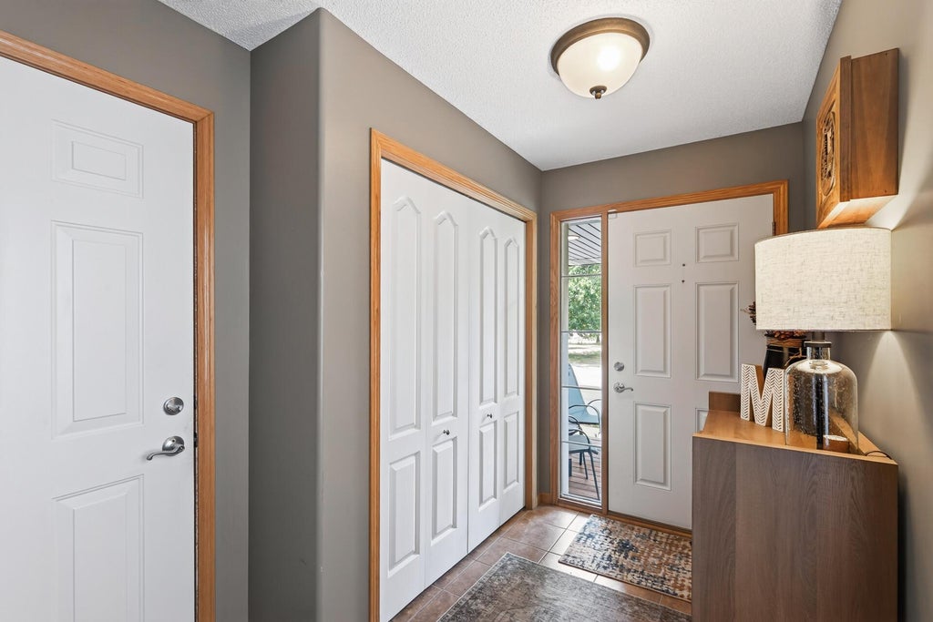 Photo of 401 Orleans Court N, Champlin, MN 55316 (MLS # 7118820)