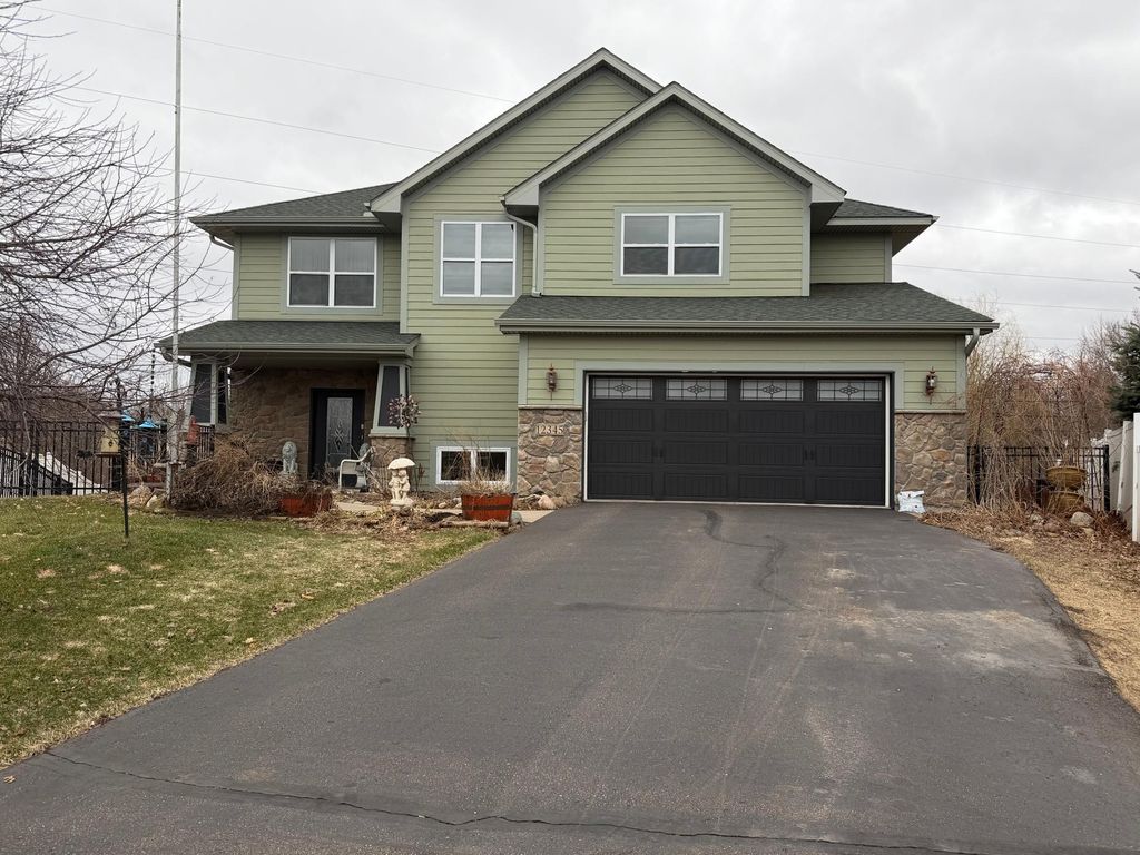 Photo of 12345 Butternut Street NW, Coon Rapids, MN 55448 (MLS # 6806306)