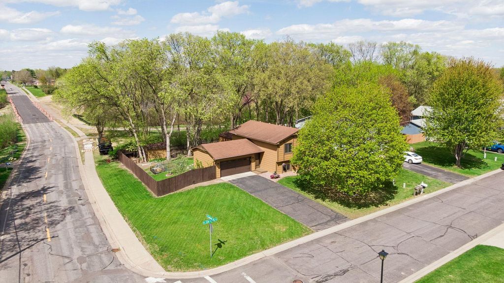 Photo of 202 Elm Creek Road, Champlin, MN 55316 (MLS # 7067671)