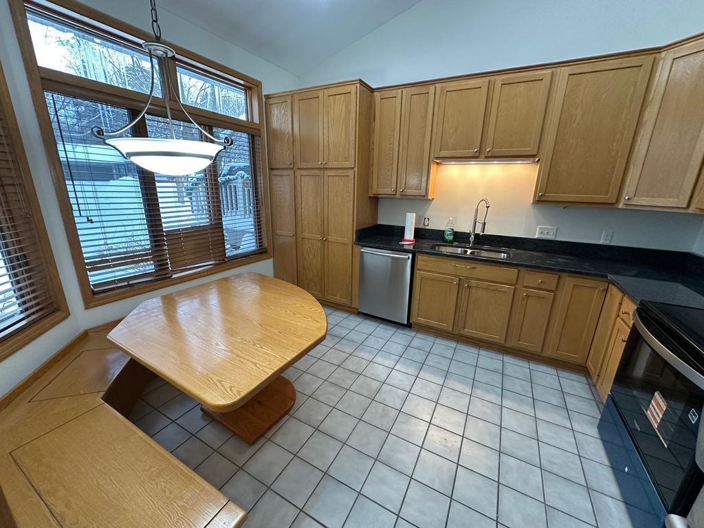 Photo of 8487 Rice Lake Road, Maple Grove, MN 55369 (MLS # 6824475)