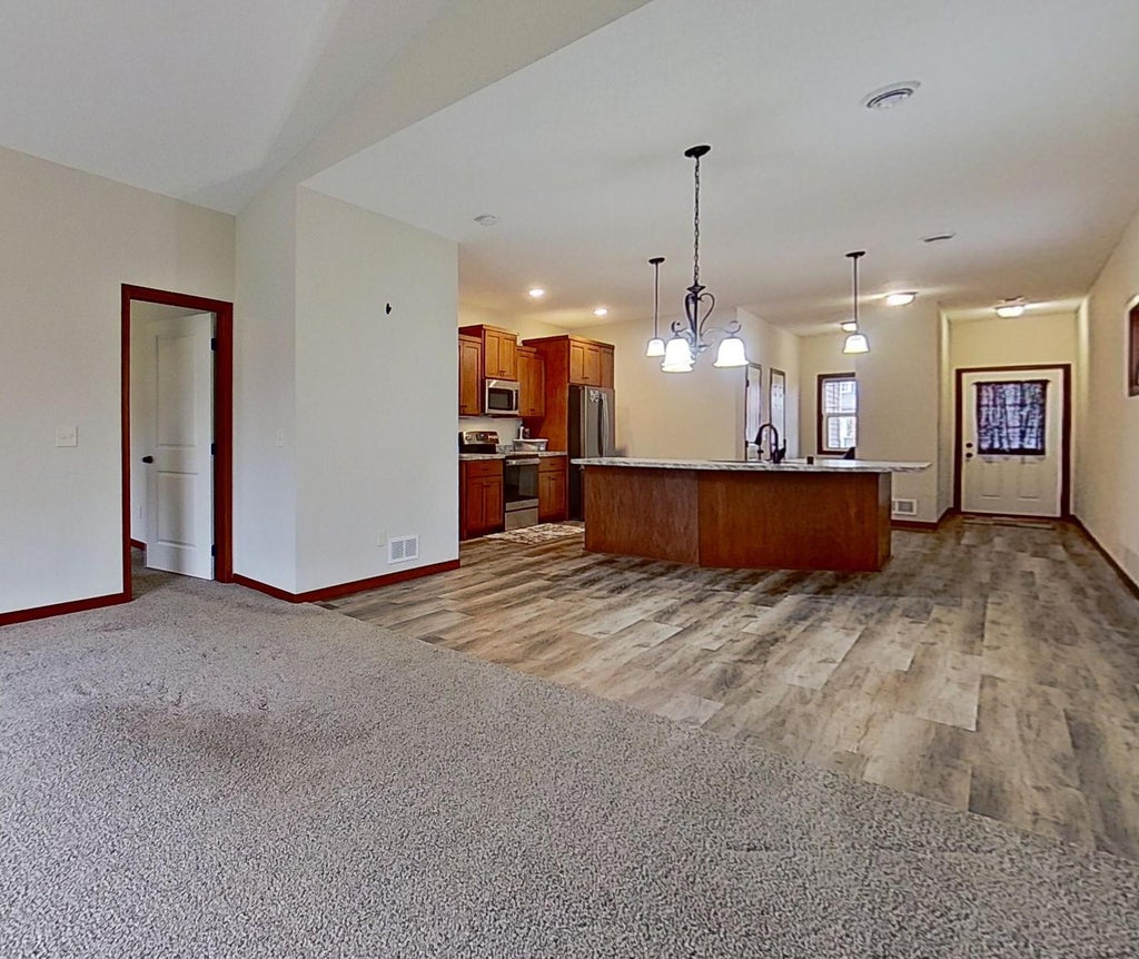 Photo of 715 Cherrywood Lane NE, Isanti, MN 55040 (MLS # 7166642)