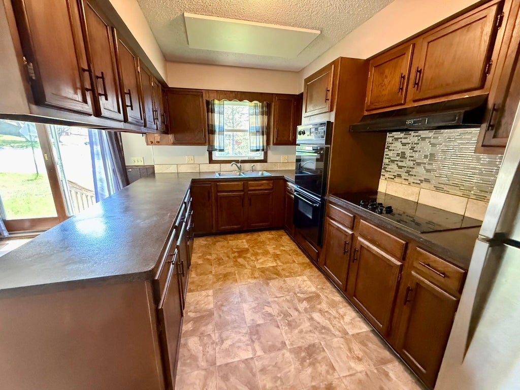 Photo of 911 2nd Avenue S, Buffalo, MN 55313 (MLS # 7089211)