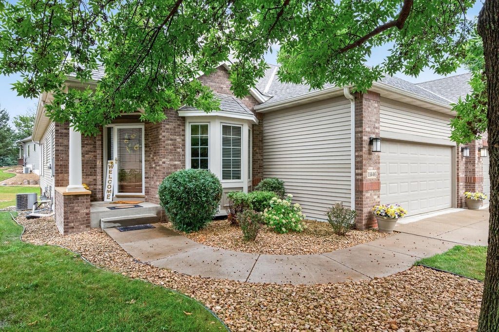 Photo of 11446 Preserve Lane N, Champlin, MN 55316 (MLS # 7120822)