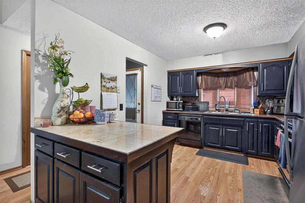 Photo of 9547 Irving Avenue N, Brooklyn Park, MN 55444 (MLS # 7143696)