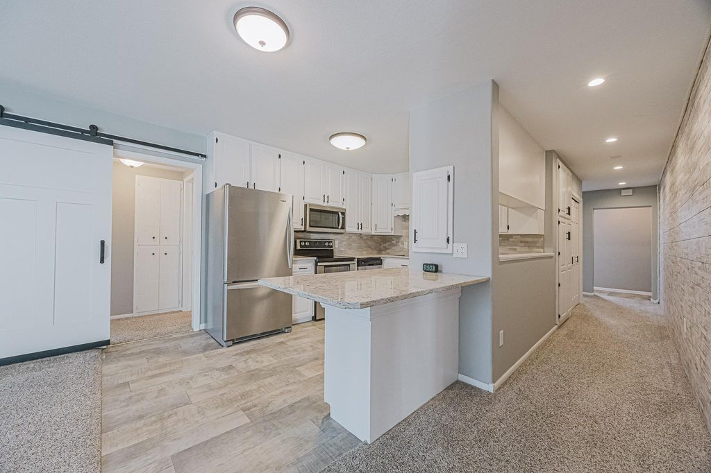 Photo of 315 Park Lake Boulevard #414, Detroit Lakes, MN 56501 (MLS # 7060542)