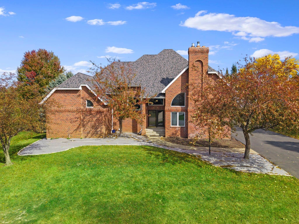 Photo of 9490 Wedgewood Drive, Woodbury, MN 55125 (MLS # 7156644)