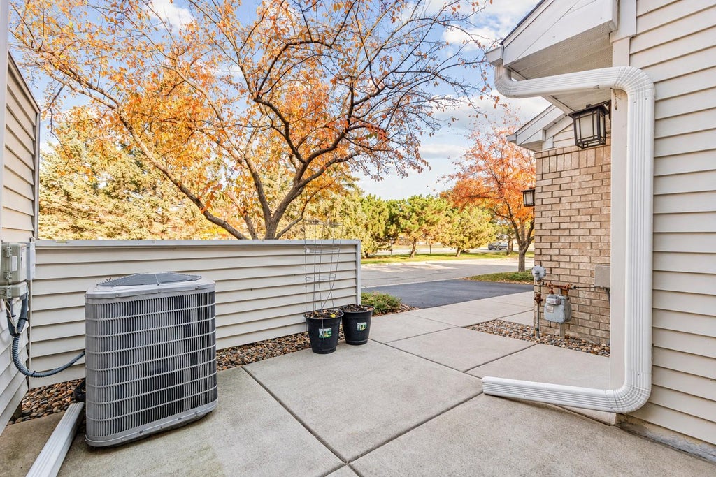 Photo of 9199 Troon Court, Woodbury, MN 55125 (MLS # 7163537)