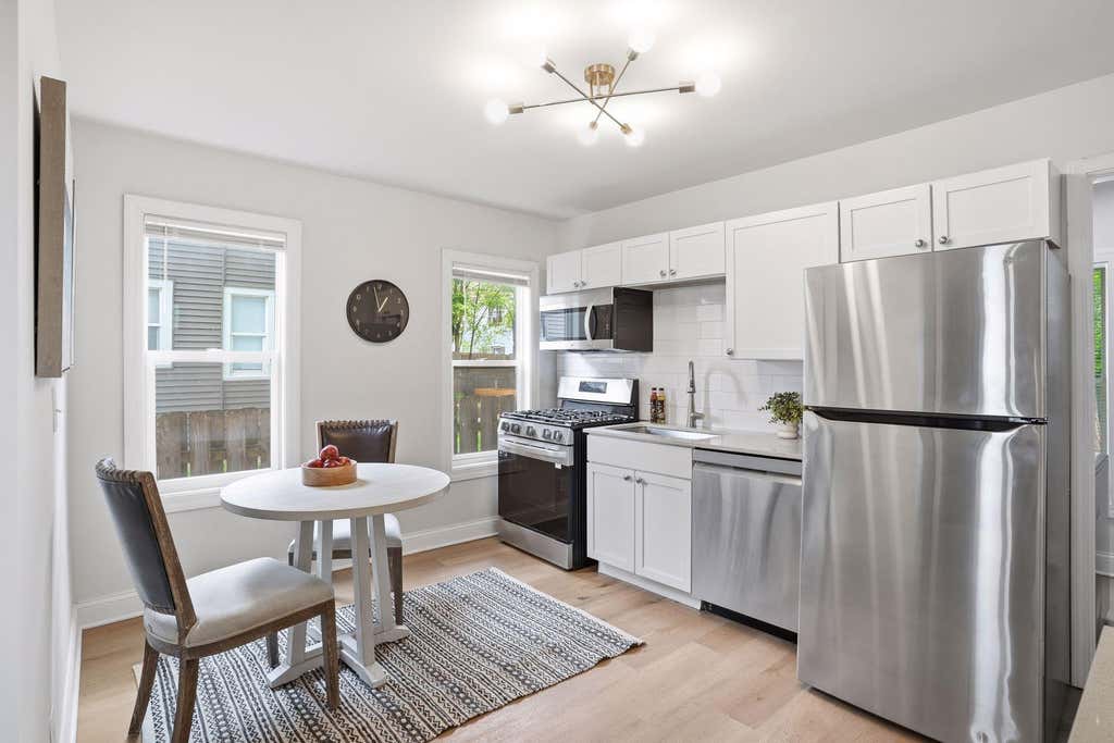 Photo of 826 20th Avenue NE, Minneapolis, MN 55418 (MLS # 7088000)