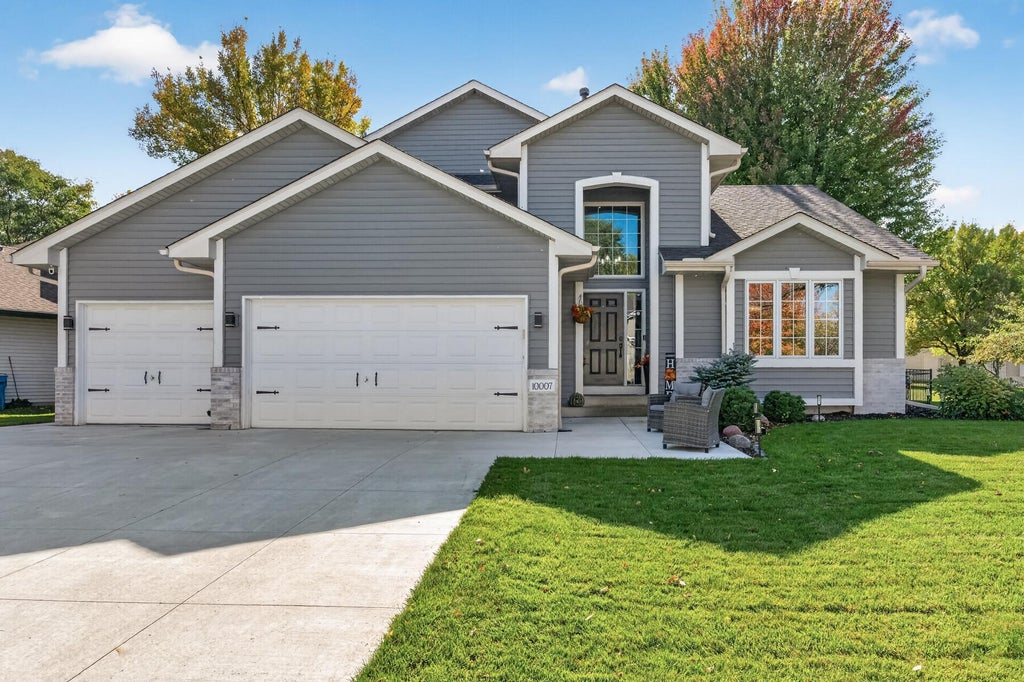 Photo of 10007 Hidden Oaks Lane N, Champlin, MN 55316 (MLS # 7157027)