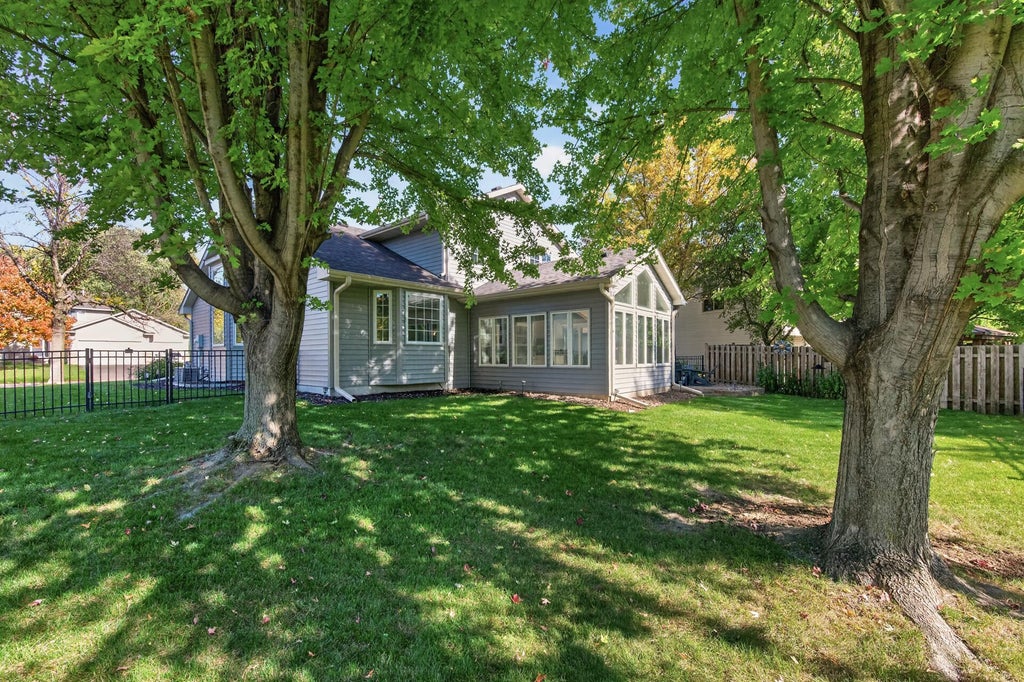 Photo of 10007 Hidden Oaks Lane N, Champlin, MN 55316 (MLS # 7157027)