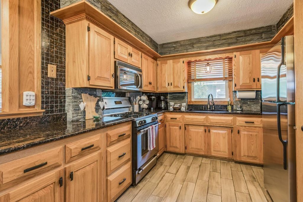 Photo of 3653 Roosevelt Street NE, Saint Anthony, MN 55418 (MLS # 7015136)