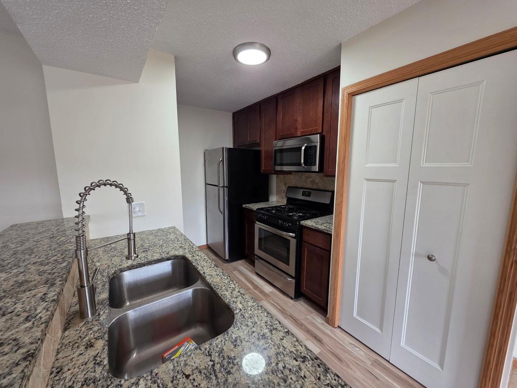 Photo of 6312 83rd Court N, Brooklyn Park, MN 55445 (MLS # 7036477)