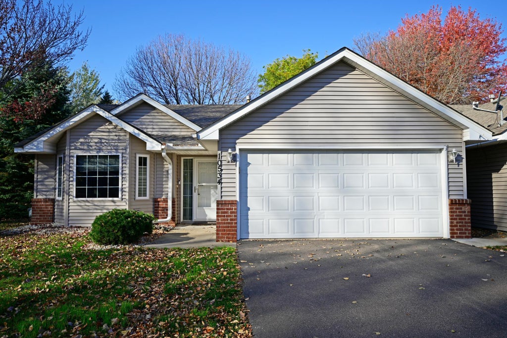 Photo of 10534 Redwood Street NW, Coon Rapids, MN 55433 (MLS # 7164031)