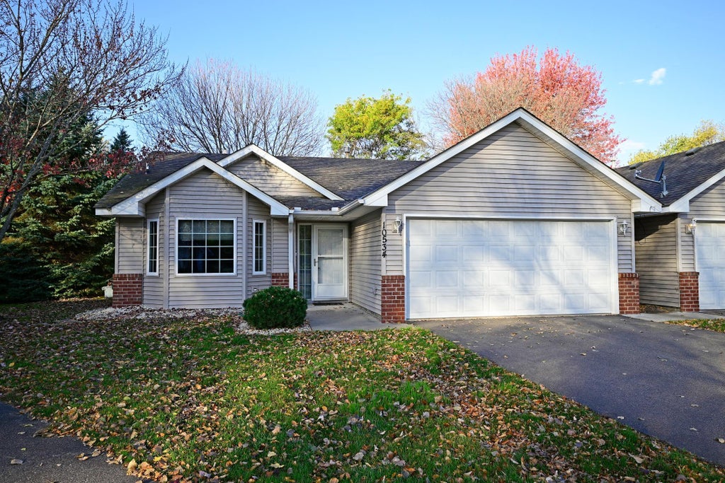 Photo of 10534 Redwood Street NW, Coon Rapids, MN 55433 (MLS # 7164031)
