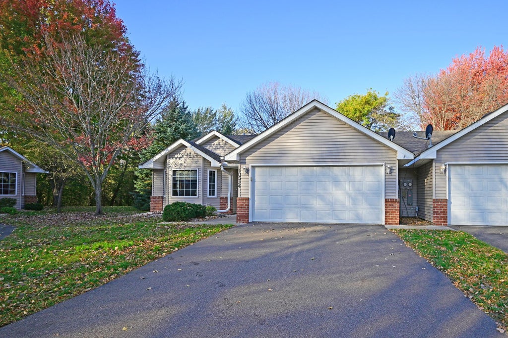 Photo of 10534 Redwood Street NW, Coon Rapids, MN 55433 (MLS # 7164031)