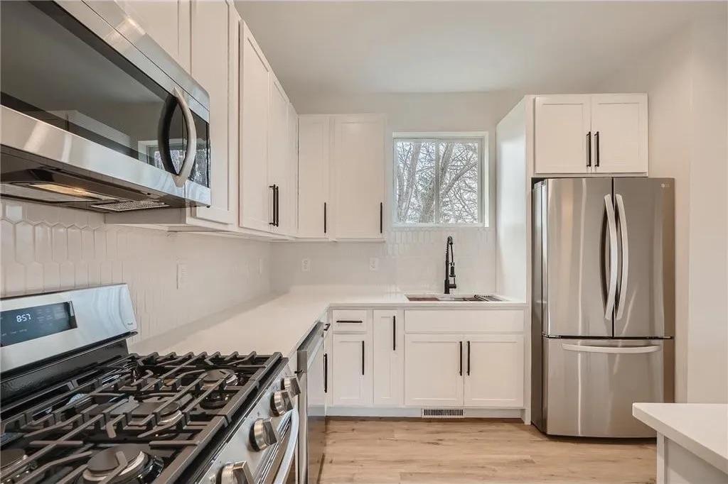 Photo of 1997 11th Avenue E #4, North Saint Paul, MN 55109 (MLS # 7148269)