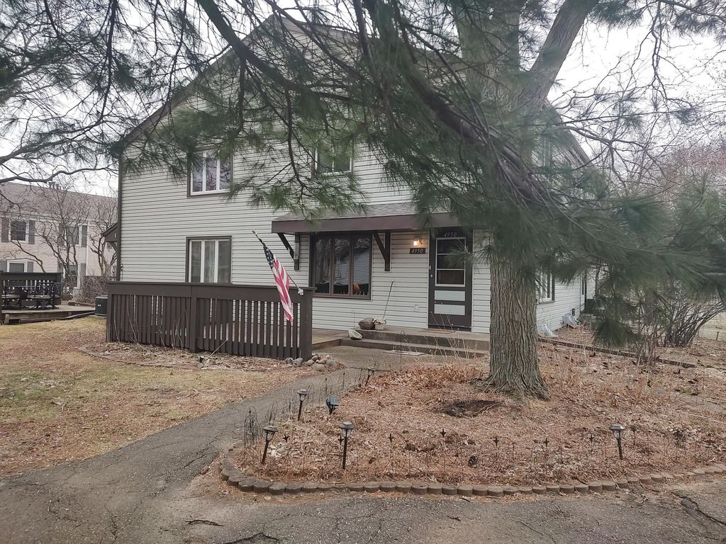 Photo of 4950 Grenwich Trail N, Oakdale, MN 55128 (MLS # 7049411)