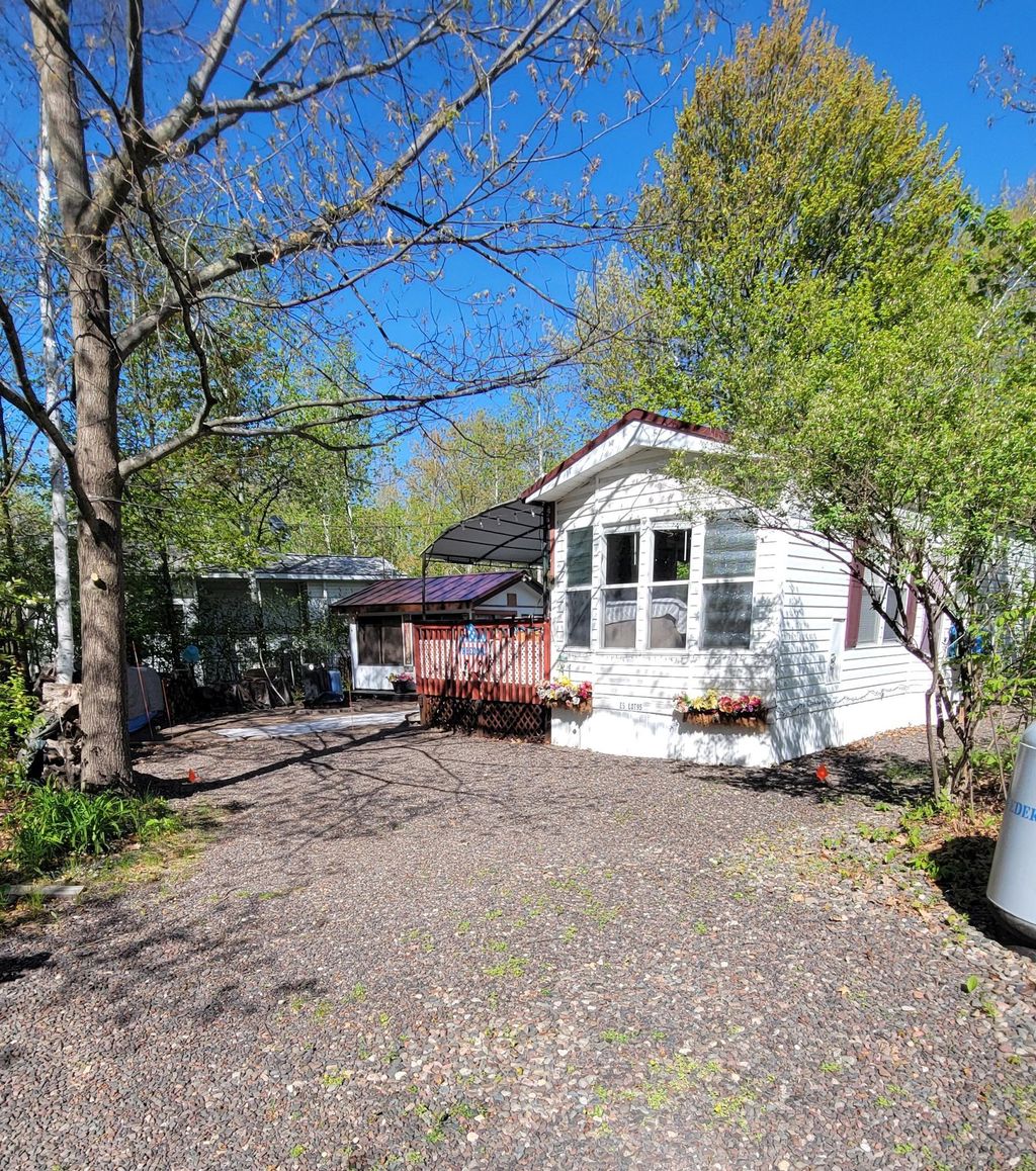 Photo of 95 Pathfinder Village, Hinckley, MN 55037 (MLS # 7077778)