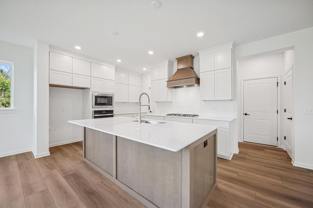 Photo of 10587 Minnesota Lane N, Maple Grove, MN 55369 (MLS # 7004426)